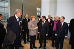Başbakan Ahmet Davutoğlu ile Gençlik ve Spor Bakanı Akif Çağatay Kılıç, Almanya Şansölyesi Angela Merkel'in başkanlık ettiği çalışma yemeğine katıldı.